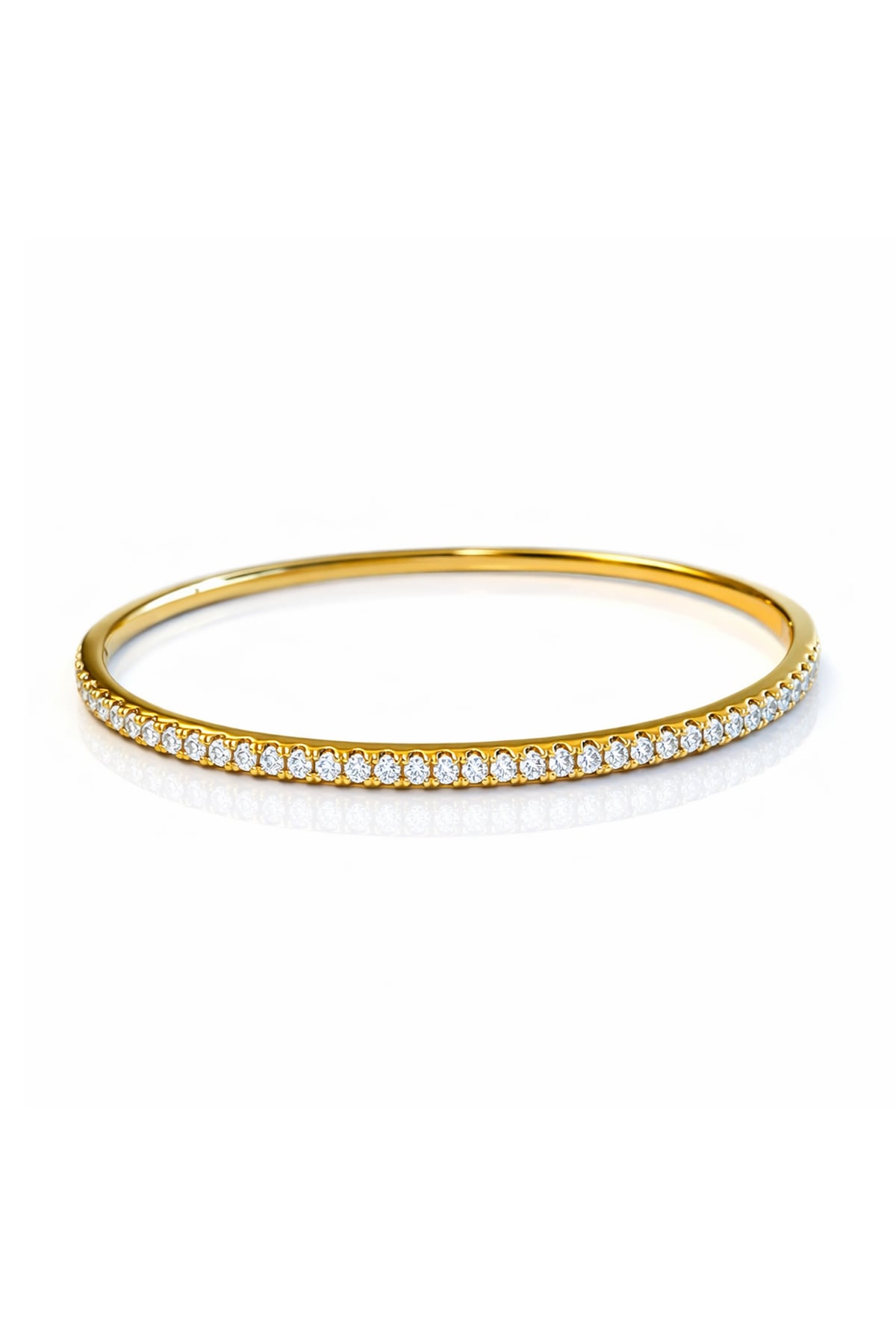 Gold bangle with diamonds on a white background