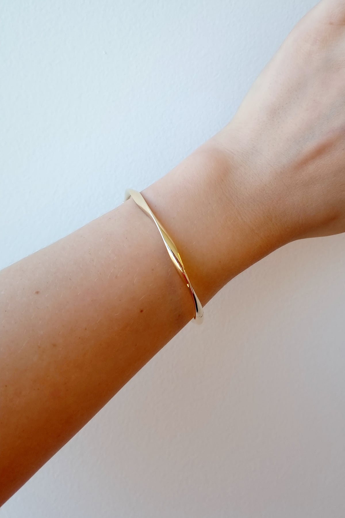 Yellow Gold Hollow Twisted Hinged Bangle