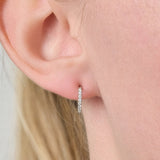 Diamond Set Small Huggie Earrings In White Gold