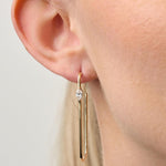 Lady wearing Large Rectangle Diamond Hoop Earrings in 18ct Yellow Gold