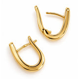 Solid Oval Huggie Earrings in Yellow Gold
