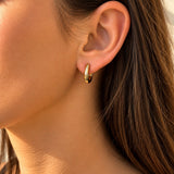 Solid Oval Huggie Earrings in Yellow Gold
