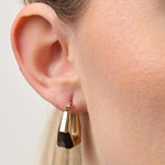 Lady wearing Thick Semi-Hexagon Hoop Earrings in 9ct Yellow Gold