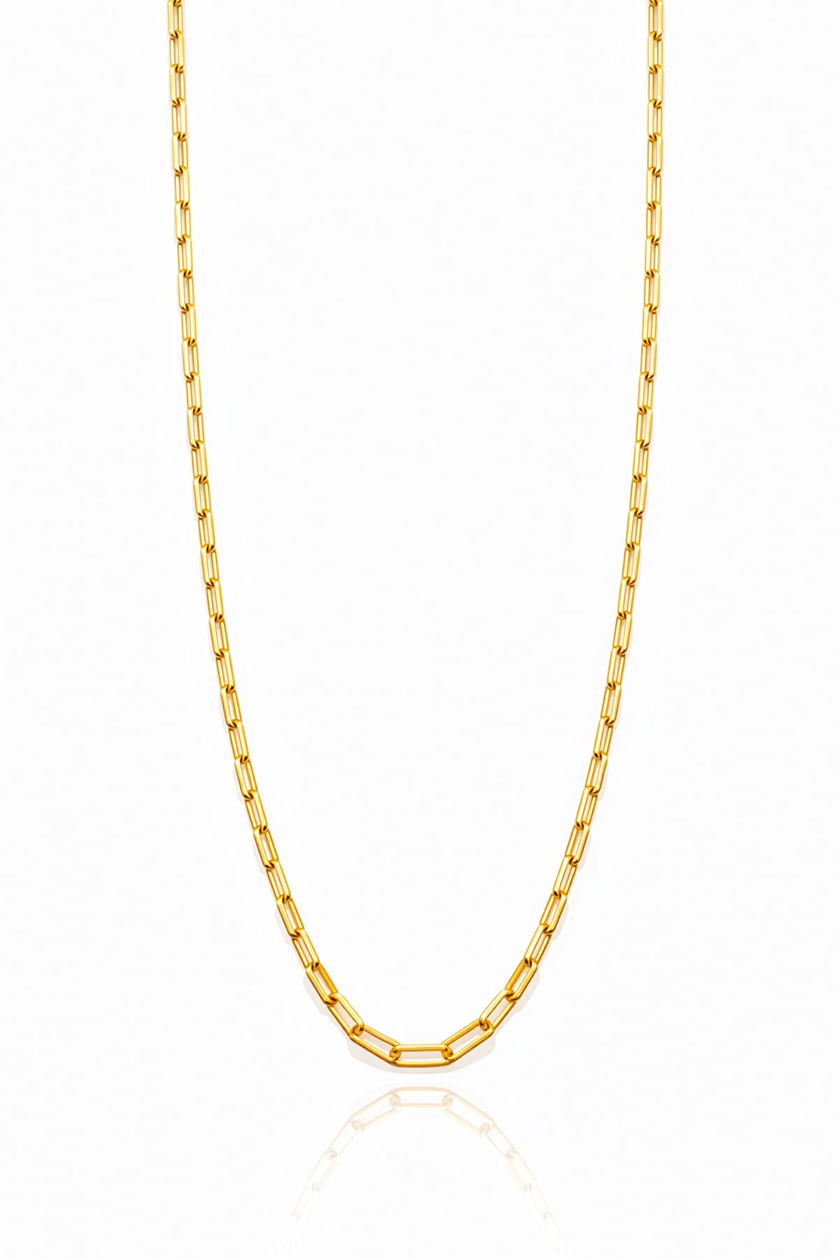 Gold chain necklace on a white background