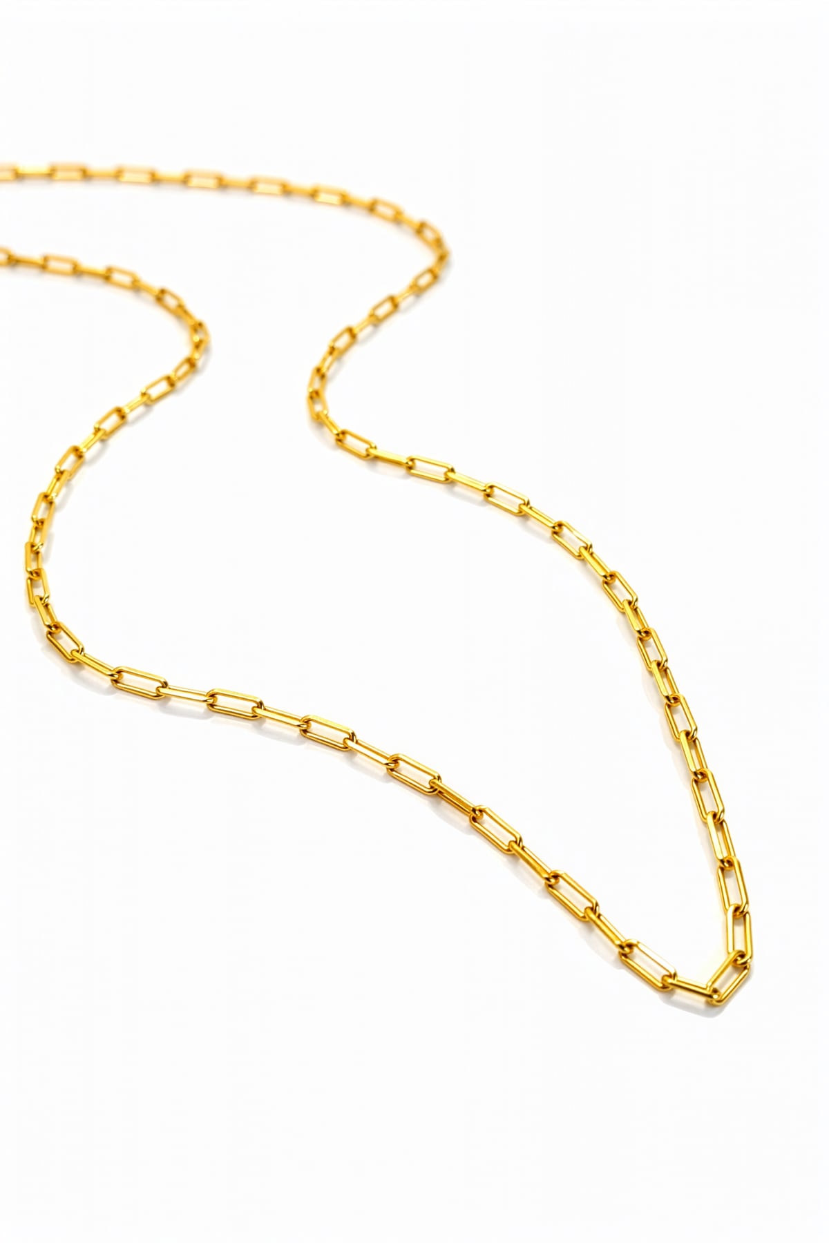 Gold chain necklace on a white background