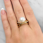 Lady wearing a Diamond and South Sea Pearl Ring set in 18ct Yellow Gold