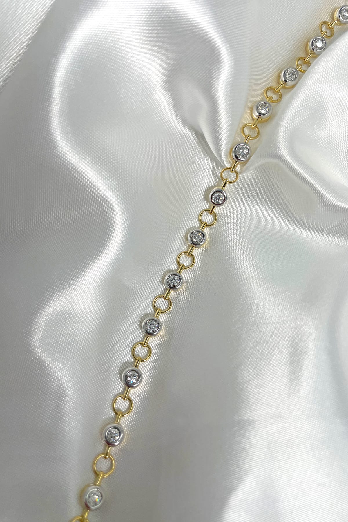 1.51ct Bezel Set Diamond Bracelet set in 18ct Yellow and White Gold available at LeGassick Diamonds and Jewellery Gold Coast, Australia.