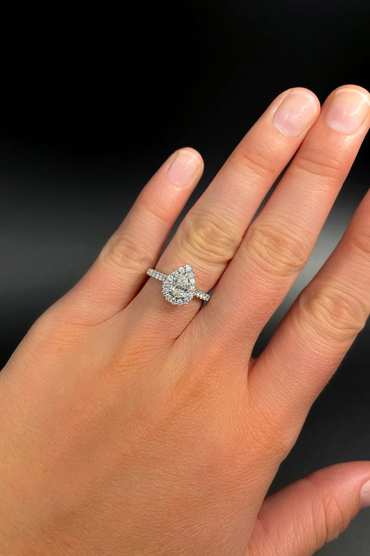 Pear deals moissanite ring