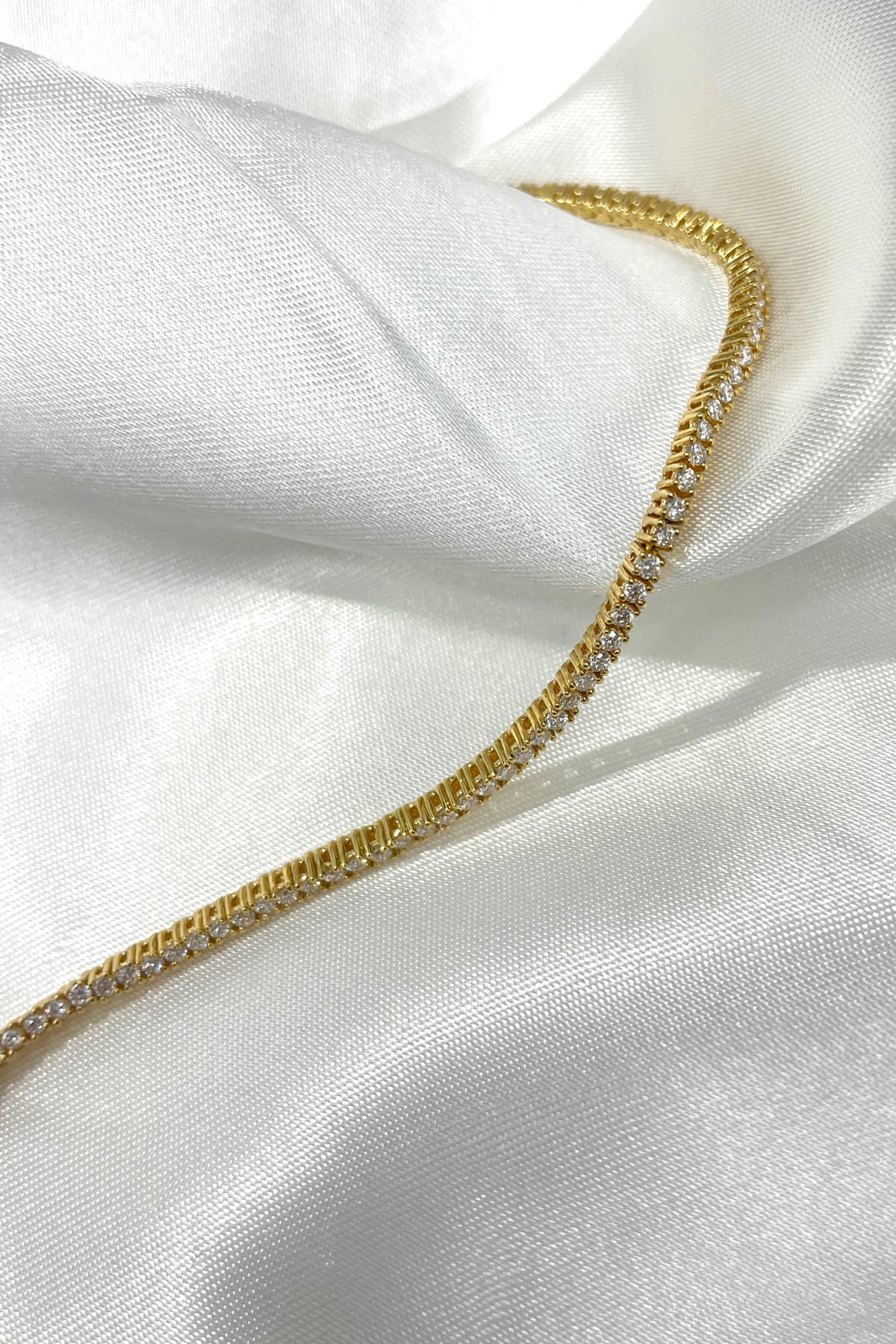 18 Carat Yellow Gold Diamond Set Tennis Bracelet available at LeGassick Diamonds and Jewellery Gold Coast, Australia.