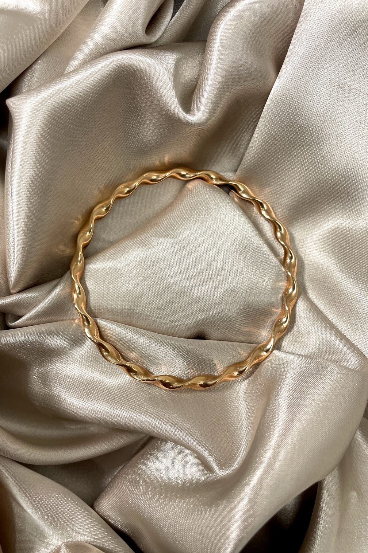 9 Carat Rose Gold Solid Wave Plain Bangle available at LeGassick Diamonds and Jewellery Gold Coast, Australia.
