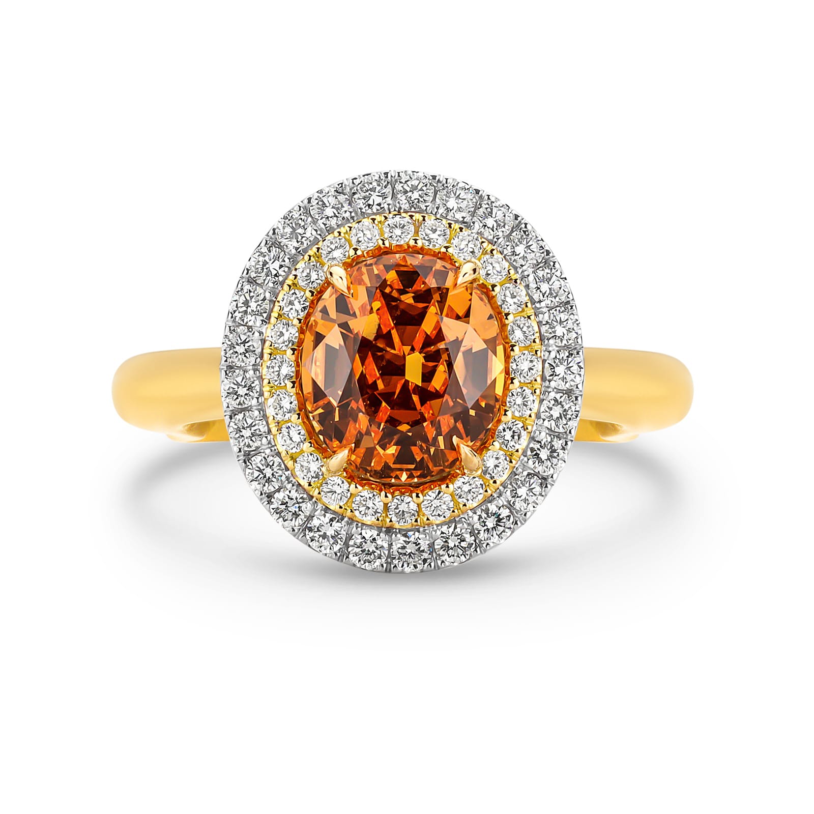 Aurelia features a rare 3.95 carat oval Mandarin garnet. Surrounding this centrepiece, Aurelia features a brilliant, gleaming double halo of white diamonds, crafted from 18 carat yellow and white gold. She was designed and handcrafted by LeGassick's Master Jewellers, Gold Coast, Australia.