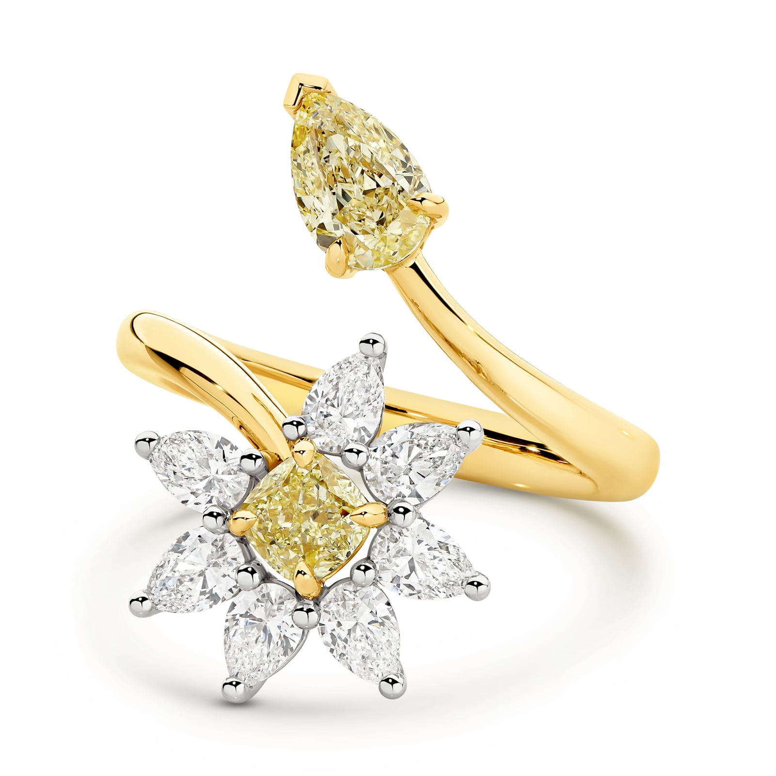 Handcrafted gold ring with yellow and clear diamonds on a white background. Eden ring part of The Beyond Luxury Collection by LeGassick.