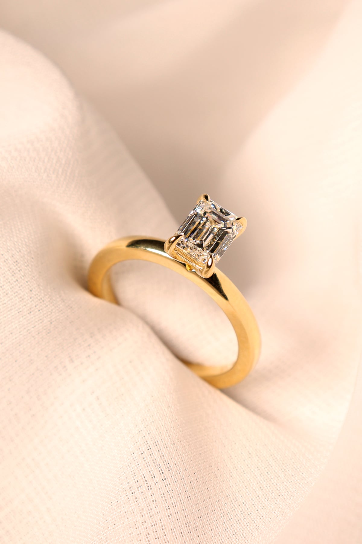 1.20 Carat Emerald Cut Diamond Set Solitaire Ring in 18k Yellow Gold from LeGassick Jewellery Gold Coast, Australia.