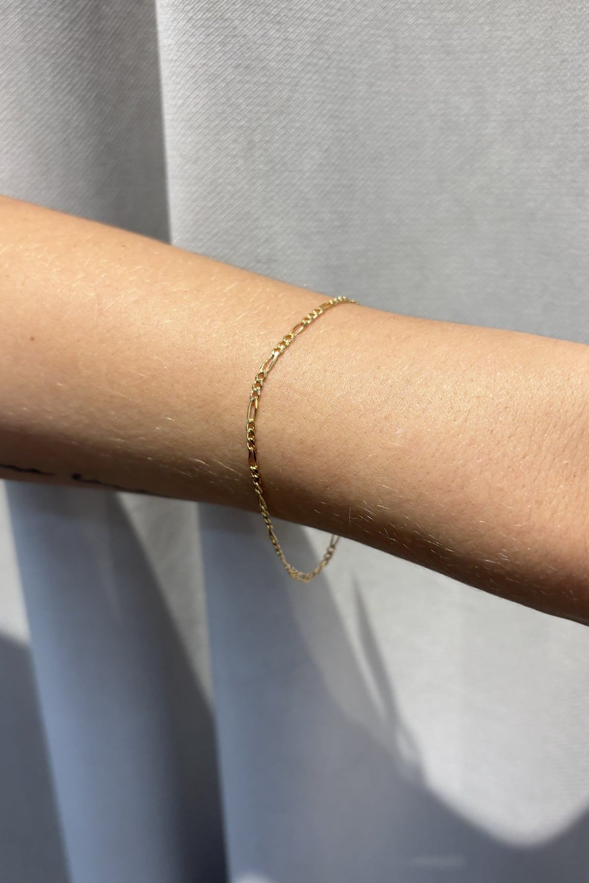 Bevelled Diamond Cut Figaro Bracelet 19cm In 9 Carat Yellow Gold available from LeGassick Fine Jewellery, Gold Coast, Australia. Showrooms at Pacific Fair and Runaway Bay Centre.