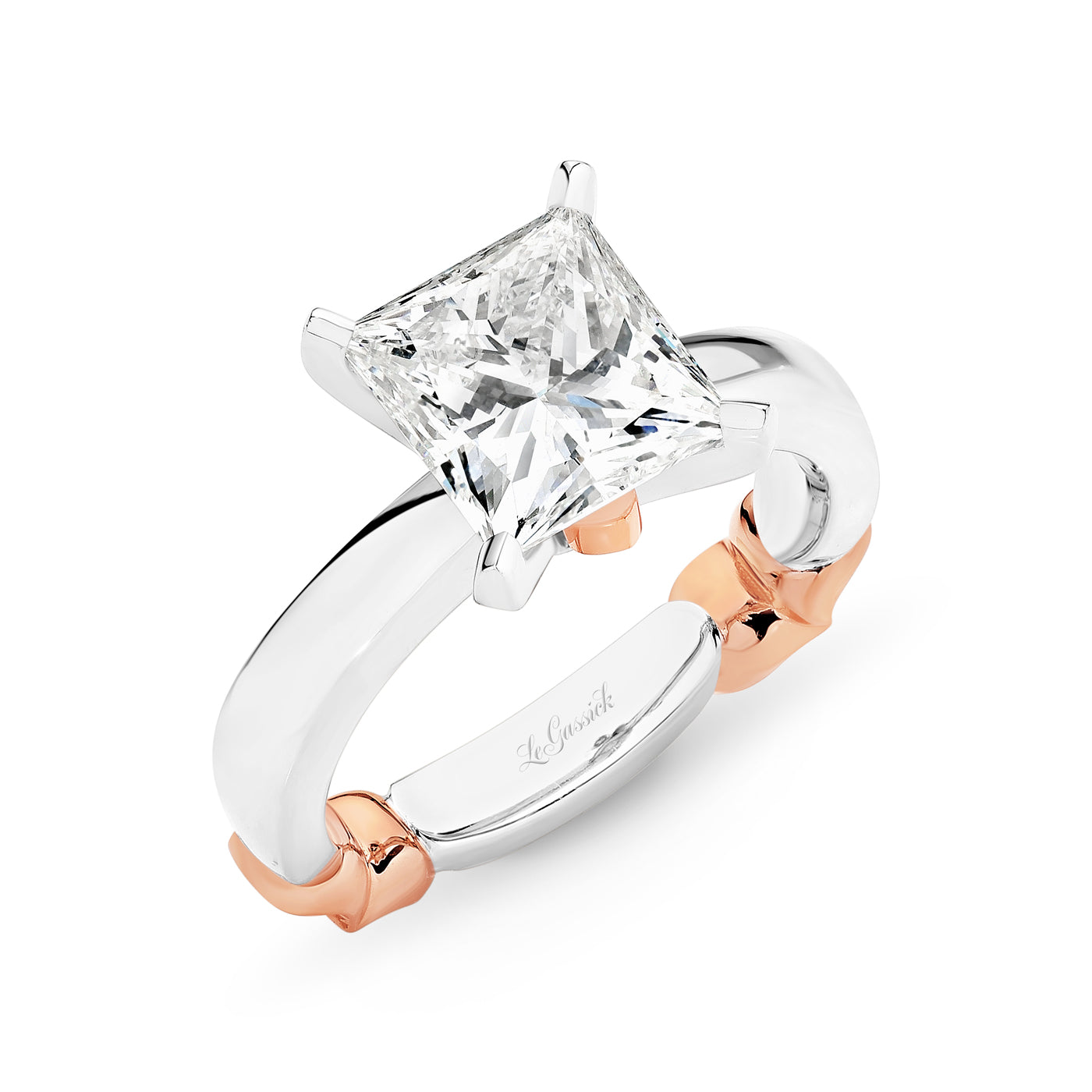 Juliette has a 3.73 Carat Princess Cut diamond centre stone. Set in 18-carat white and rose gold with three rare natural Argyle Pink diamonds. She was designed and handcrafted by LeGassick's Master Jewellers, Gold Coast, Australia.