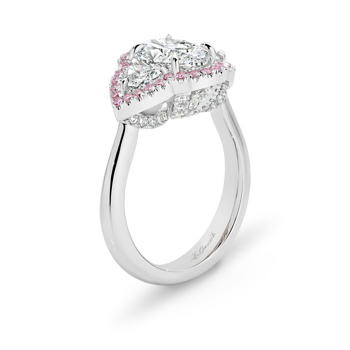 Katerina is a white & pink diamond ring with a 2 carat oval centre stone. She was designed and handcrafted by LeGassick's Master Jewellers, Gold Coast, Australia.