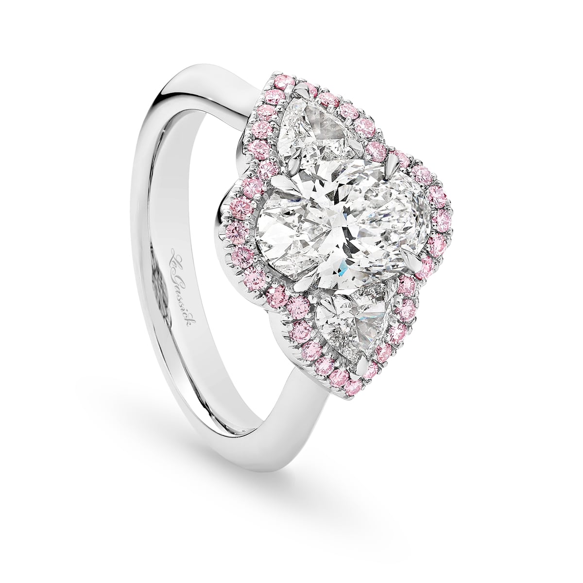 Katerina is a white & pink diamond ring with a 2 carat oval centre stone. She was designed and handcrafted by LeGassick's Master Jewellers, Gold Coast, Australia.