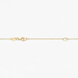 Gold chain necklace on a white background
