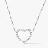 Heart-shaped diamond necklace on a white background