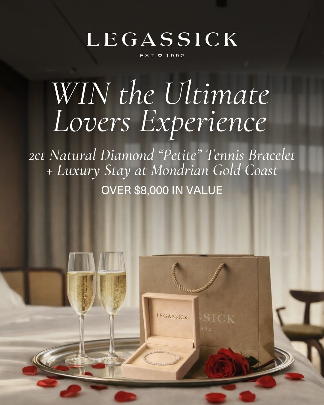 Promotional image for Legassick jewelry with diamond bracelet, champagne, and red roses on a table.