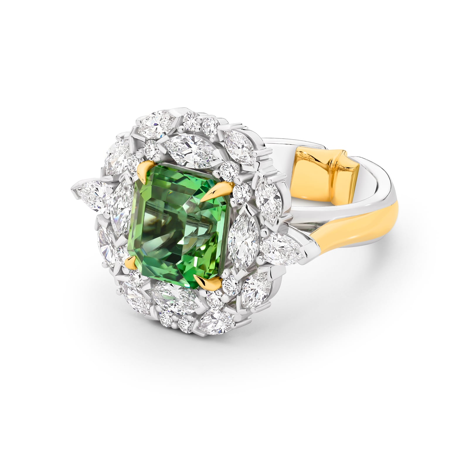 Handcrafted green tourmaline and diamond ring set in white and yellow gold on a white background. Lucinda ring part of The Beyond Luxury Collection by LeGassick.