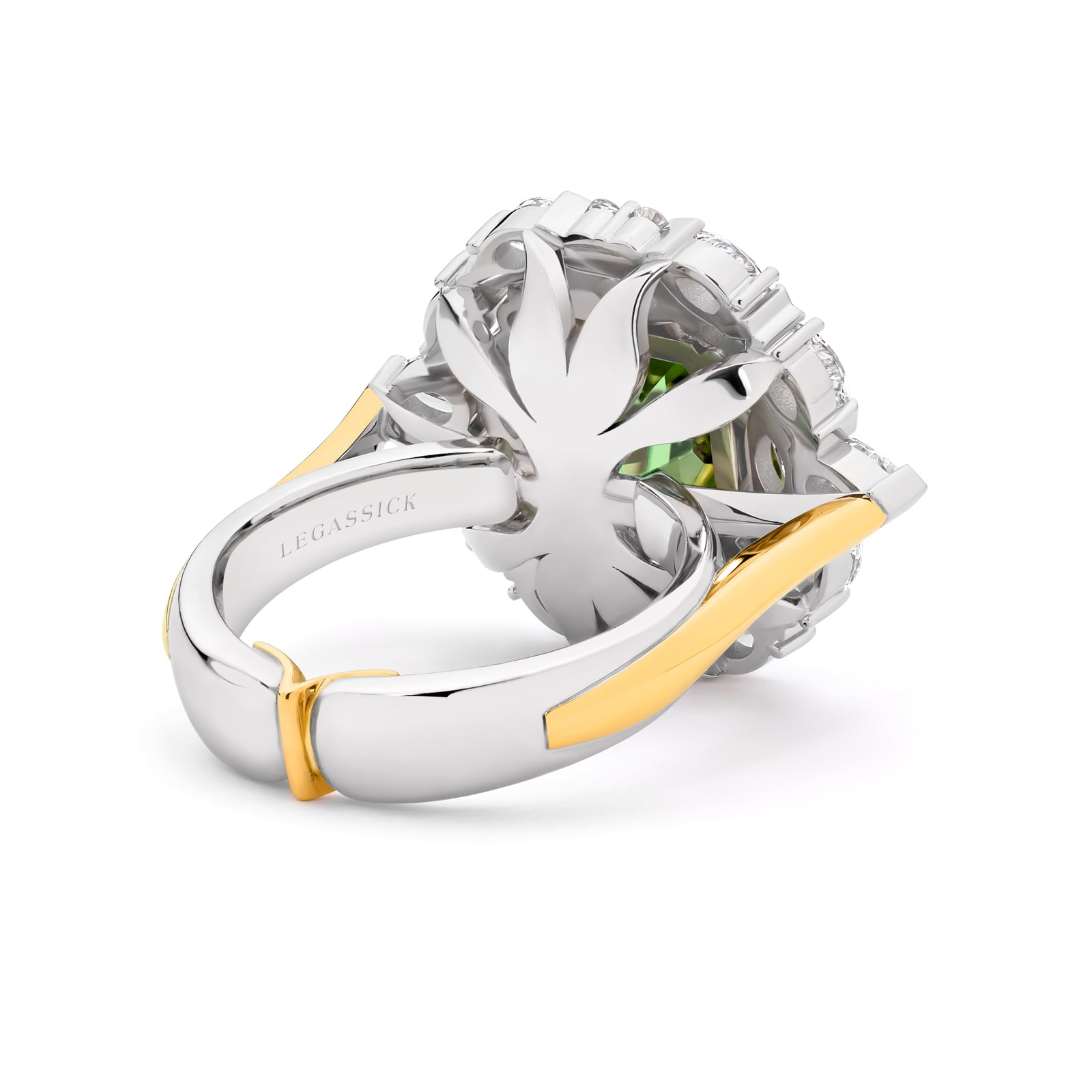 Handcrafted green tourmaline and diamond ring set in white and yellow gold on a white background. Lucinda ring part of The Beyond Luxury Collection by LeGassick.