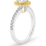 Lucy is a stunning 1 carat white diamond ring with a yellow diamond halo. Part of the Beyond Luxury Collection from LeGassick.