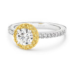 Lucy is a stunning 1 carat white diamond ring with a yellow diamond halo. Part of the Beyond Luxury Collection from LeGassick.