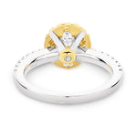 Lucy is a stunning 1 carat white diamond ring with a yellow diamond halo. Part of the Beyond Luxury Collection from LeGassick.