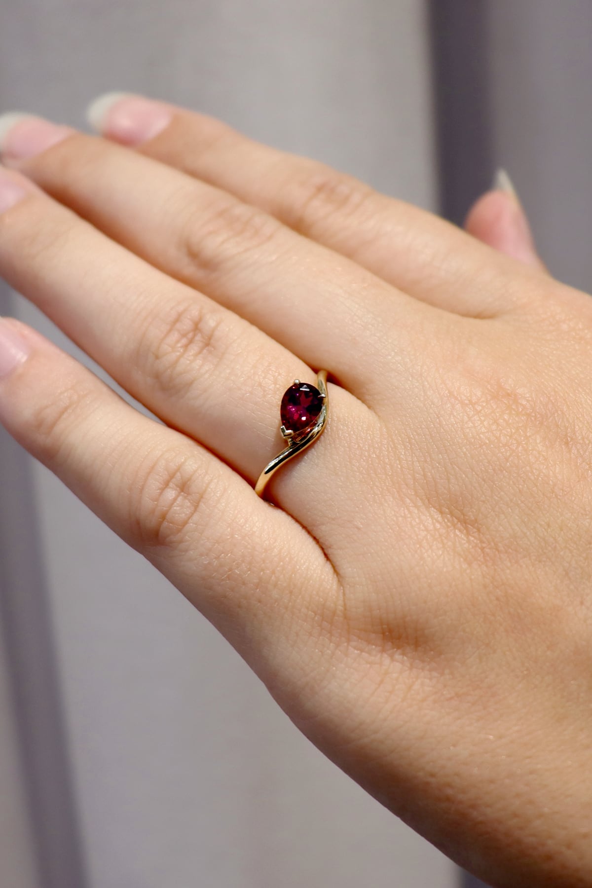 Rhodolite Garnet Pear Cut Dress Ring In 9 Carat Yellow Gold available from LeGassick Fine Jewellery, Gold Coast, Australia. Showrooms at Pacific Fair and Runaway Bay Centre.