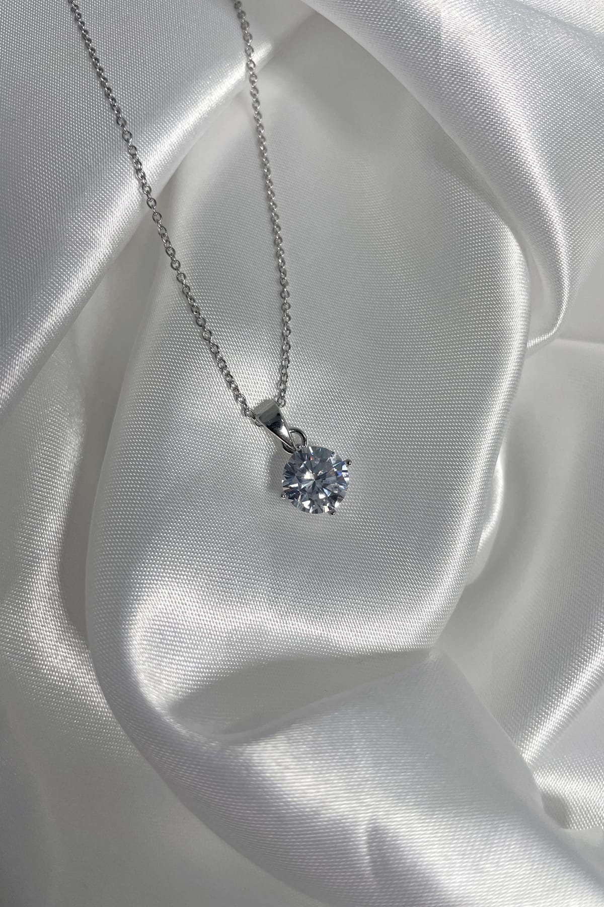 Sterling Silver 8mm 4 Claw Round Cubic Zirconia Pendant with Chain available at LeGassick Diamonds and Jewellery Gold Coast, Australia.