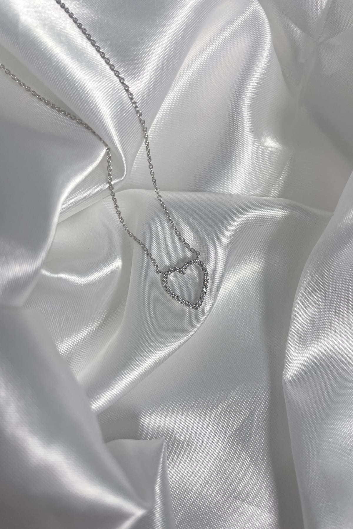 Sterling Silver CZ Open Heart Pendant with Chain available at LeGassick Diamonds and Jewellery Gold Coast, Australia.