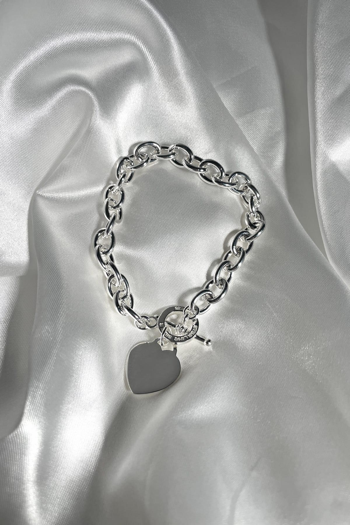 Sterling Silver Oval Cable Bracelet with Ring & Heart available at LeGassick Diamonds and Jewellery Gold Coast, Australia.