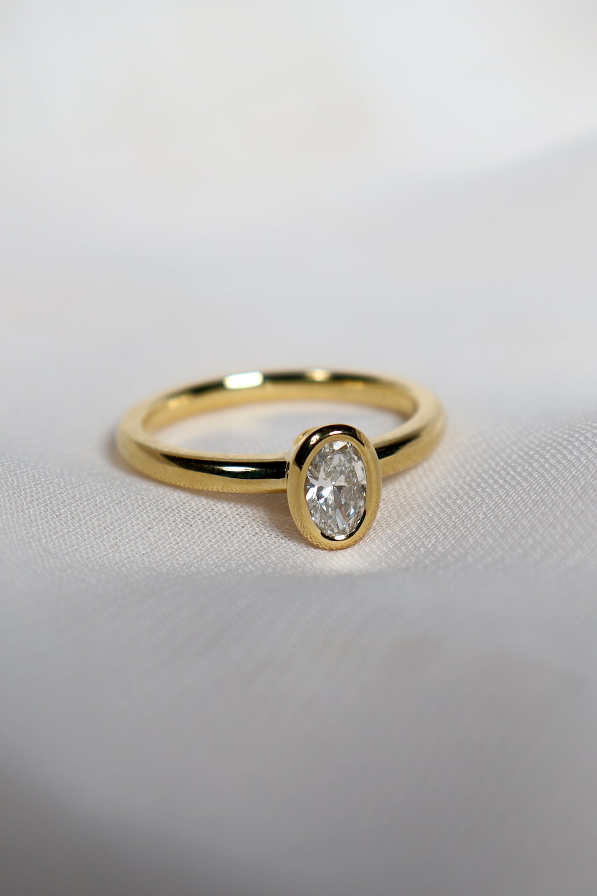 Yellow Gold 0.50ct Oval Cut FSI1 Rubover Set Diamond Ring from LeGassick Jewellery, Gold Coast, Australia.