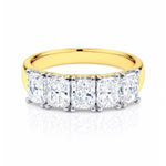 5 Stone gold and lab diamond ring on a white background