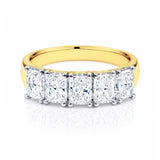 5 Stone gold and lab diamond ring on a white background