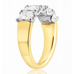 5 Stone gold and lab diamond ring on a white background