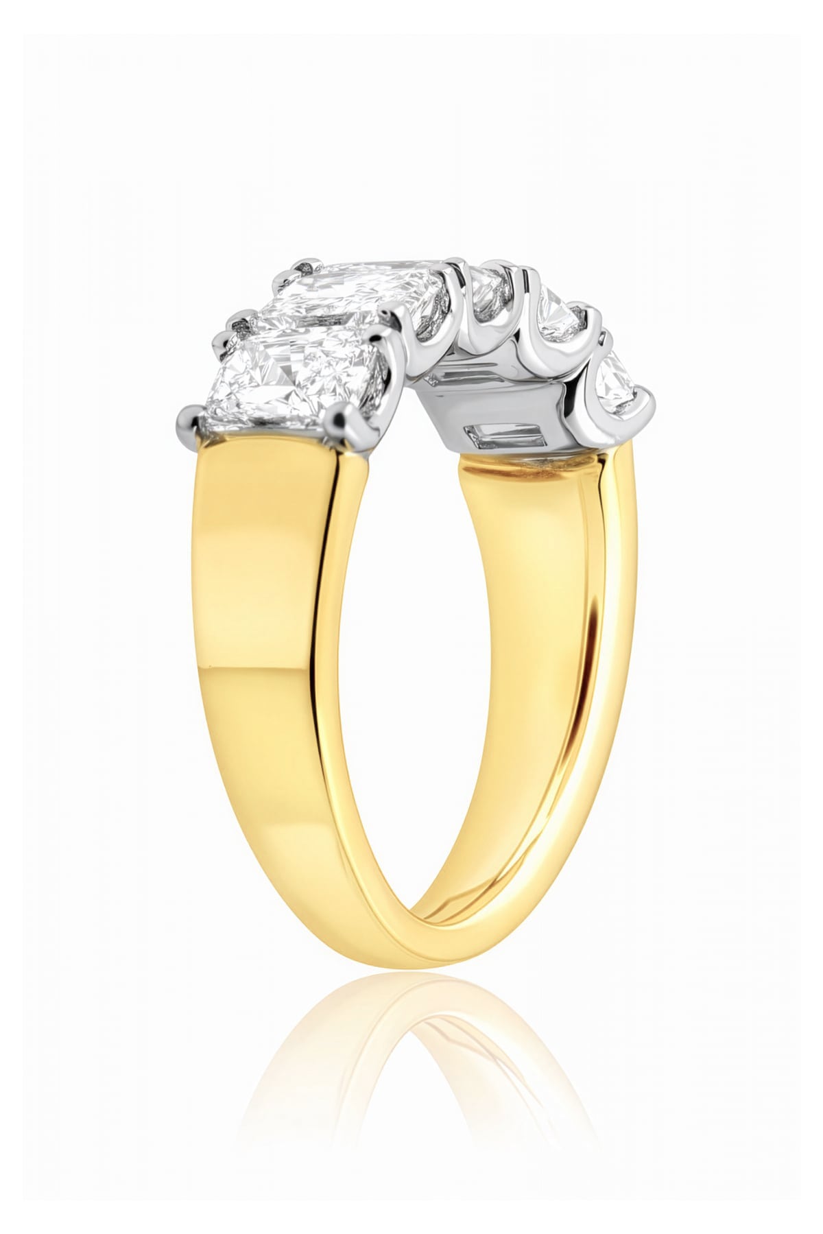 5 Stone gold and lab diamond ring on a white background