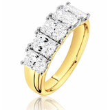 5 Stone gold and lab diamond ring on a white background