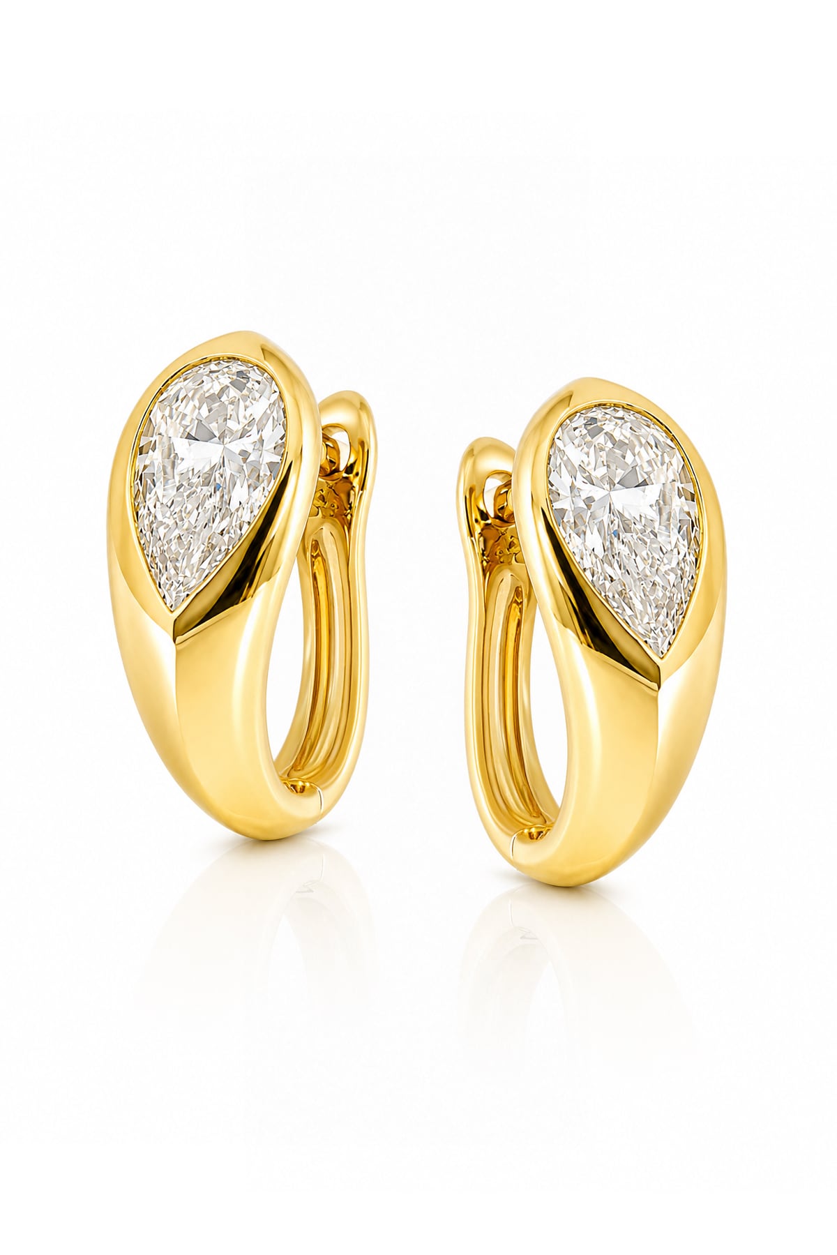 A pair of gold huggie hoop earrings with pear-cut diamond inlays, shown on a clean white background with a soft reflection.
