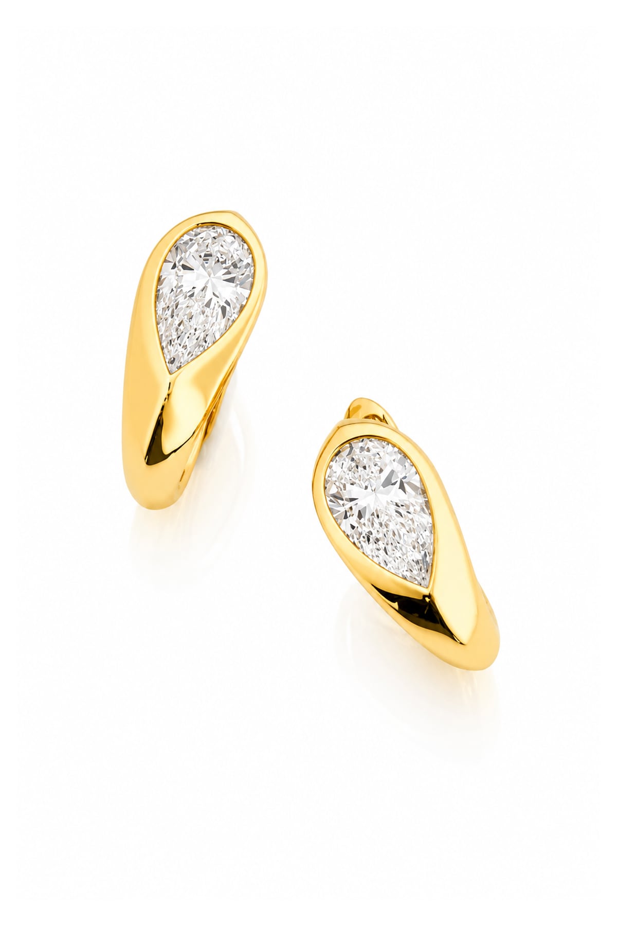 A pair of gold huggie hoop earrings with pear-cut diamond inlays, shown on a clean white background with a soft reflection.