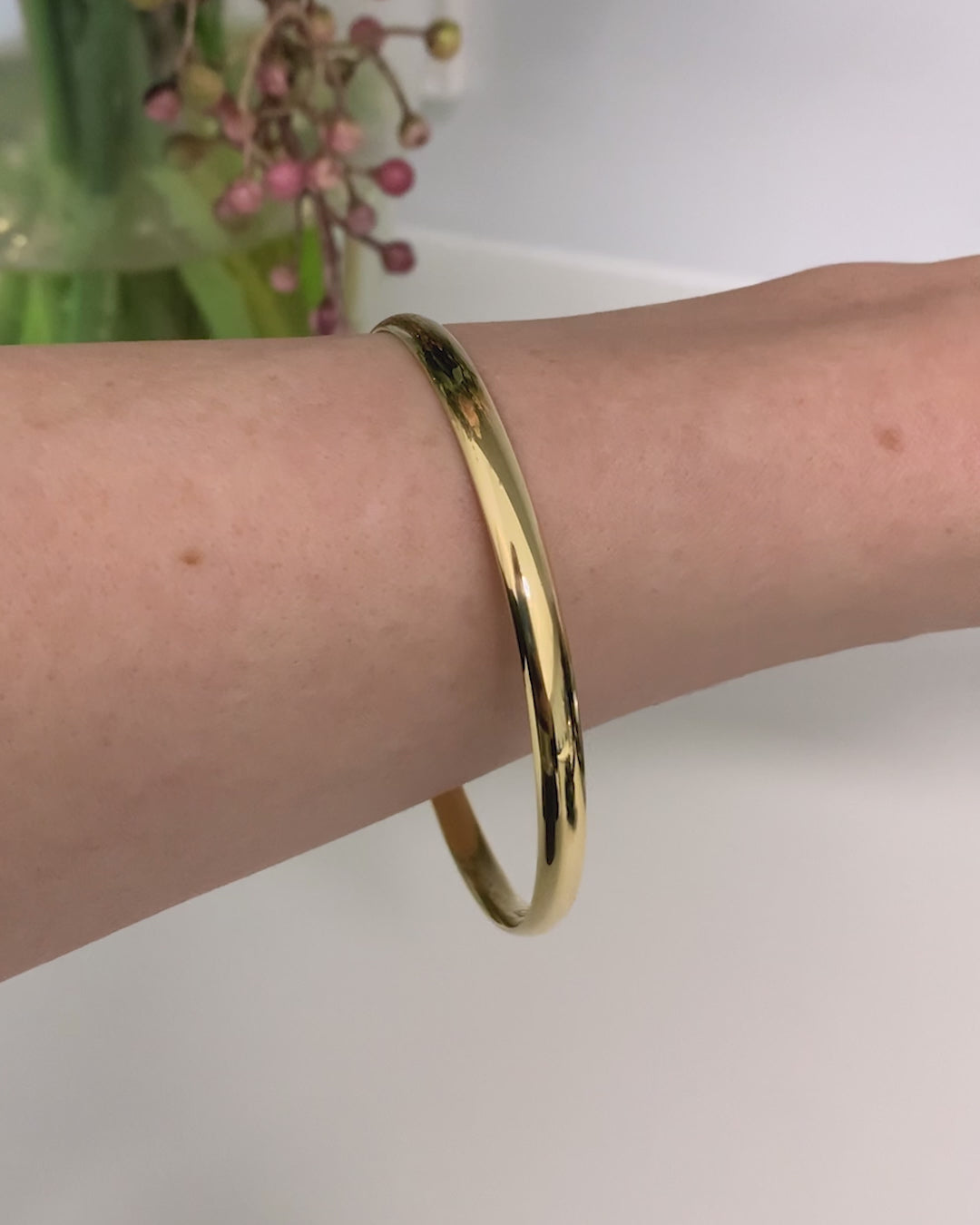 Solid 9 Carat Yellow Gold 5mm Wide Bangle available at LeGassick Diamonds and Jewellery Gold Coast, Australia.