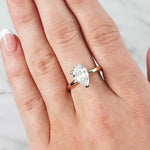Lady wearing Angelina... 2 Carat Pear Cut Solitaire Lab Created Diamond Ring