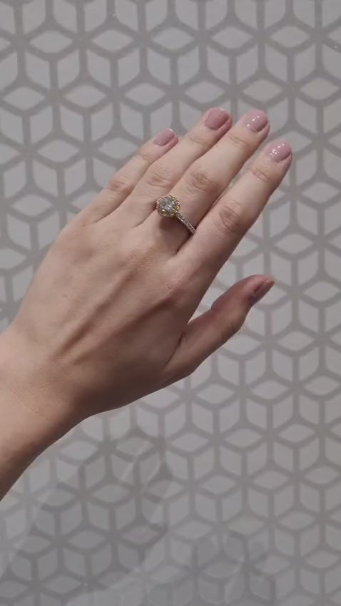 Lucy is a stunning 1 carat white diamond ring with a yellow diamond halo. Part of the Beyond Luxury Collection from LeGassick.