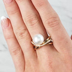 Lady wearing a Diamond and South Sea Pearl Ring set in 18ct Yellow Gold