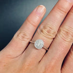 Lady wearing a Double Oval Diamond Halo Engagement Ring set in 18ct White Gold