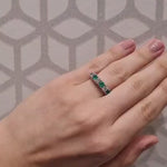 Emerald And Diamond Ring in 18 Carat Yellow And White Gold on lady's finger.