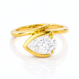 Gold ring with a large lab diamond on a white background