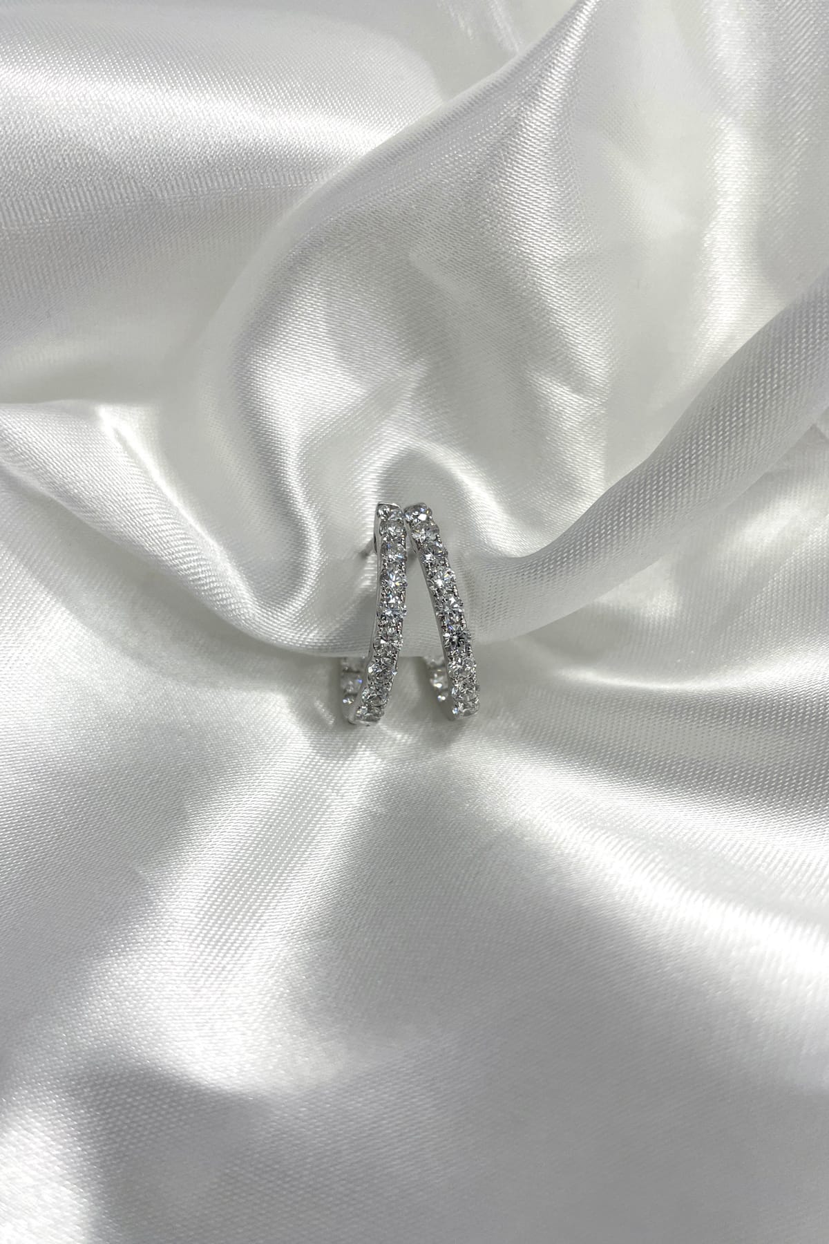 18 Carat Gold Claw Set Day Night Diamond Earrings available at LeGassick Diamonds and Jewellery Gold Coast, Australia.