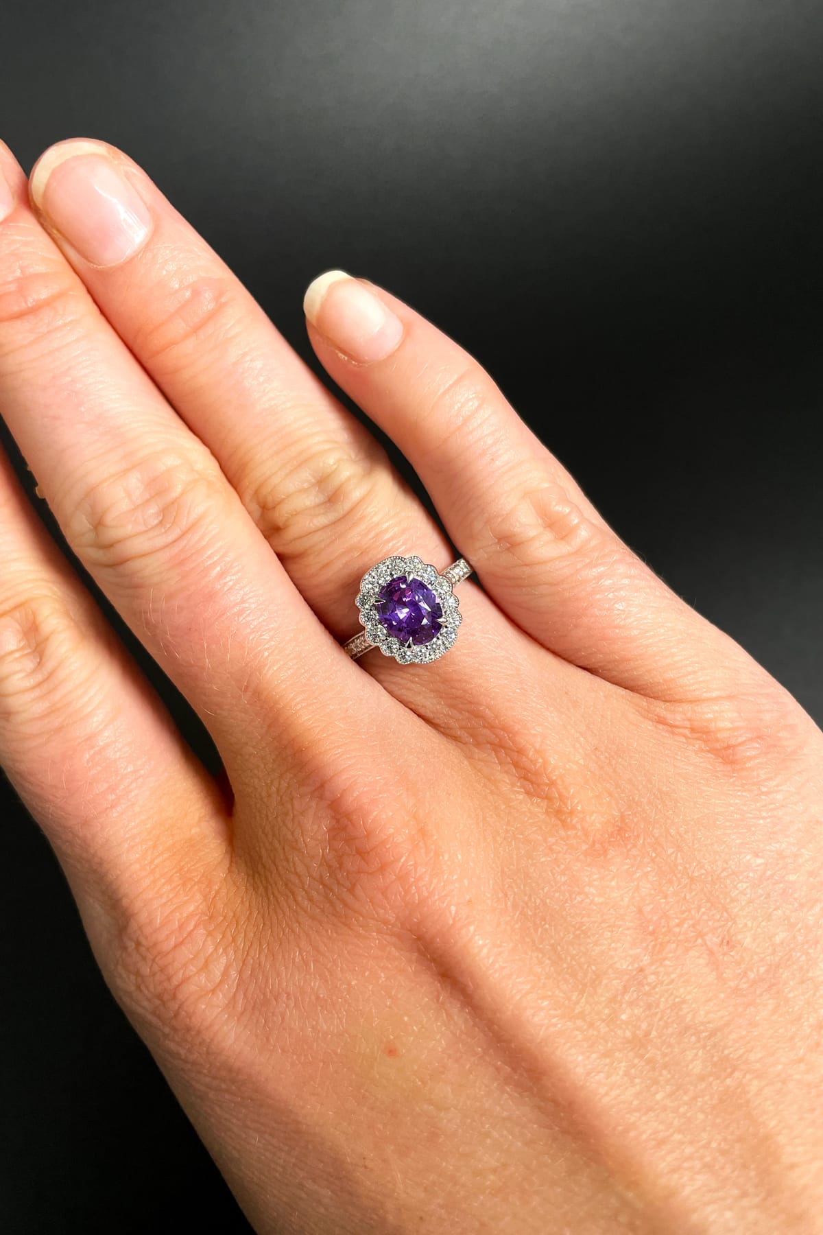 18 Carat White Gold With 1.56 Carat Purple Sapphire Diamond Halo Ring available at LeGassick Diamonds and Jewellery Gold Coast, Australia.